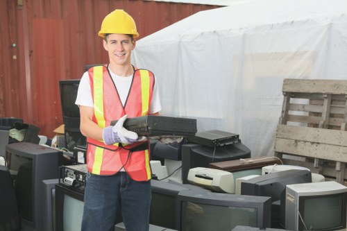 Professional team handling demolition waste removal in Osterley