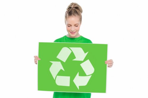Team managing waste disposal with grab hire services